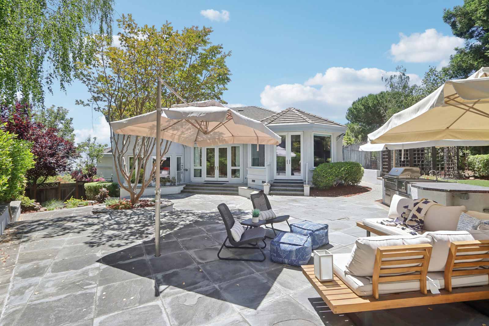 Fremont custom home spacious backyard entertaining areas